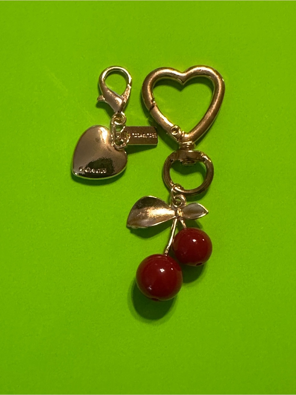 Gold Fashion Coach Heart & Cherry Charm Keychain - Red Cherries. This is Fashion
